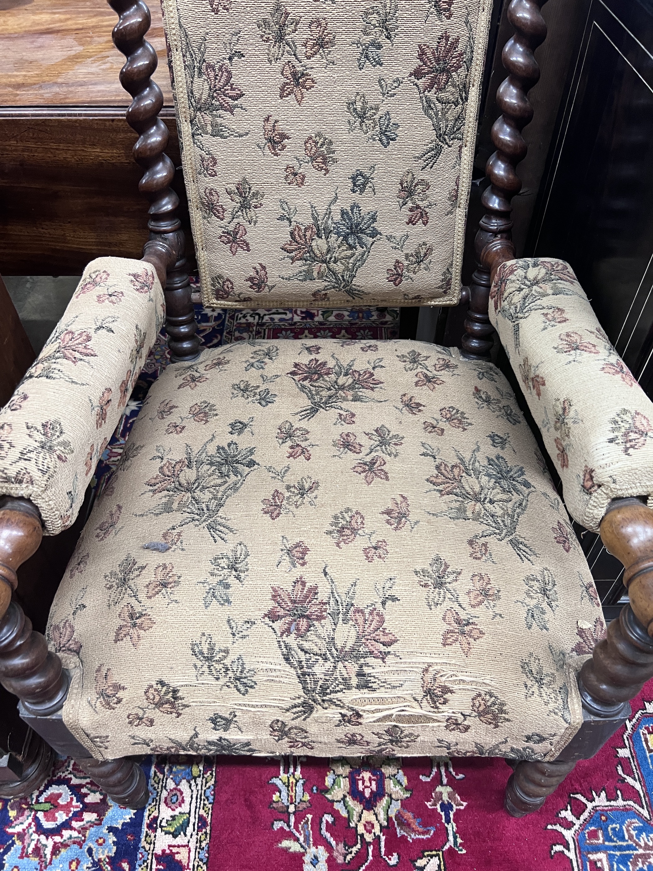 A Victorian carved spiral turned mahogany armchair, width 60cm, depth 60cm, height 118cm